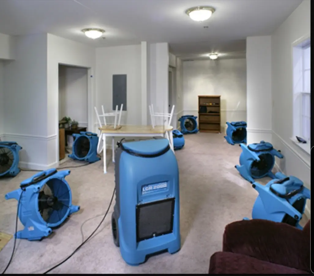 Air movers and dehumidifier setup for Water Damage Restoration in Olathe